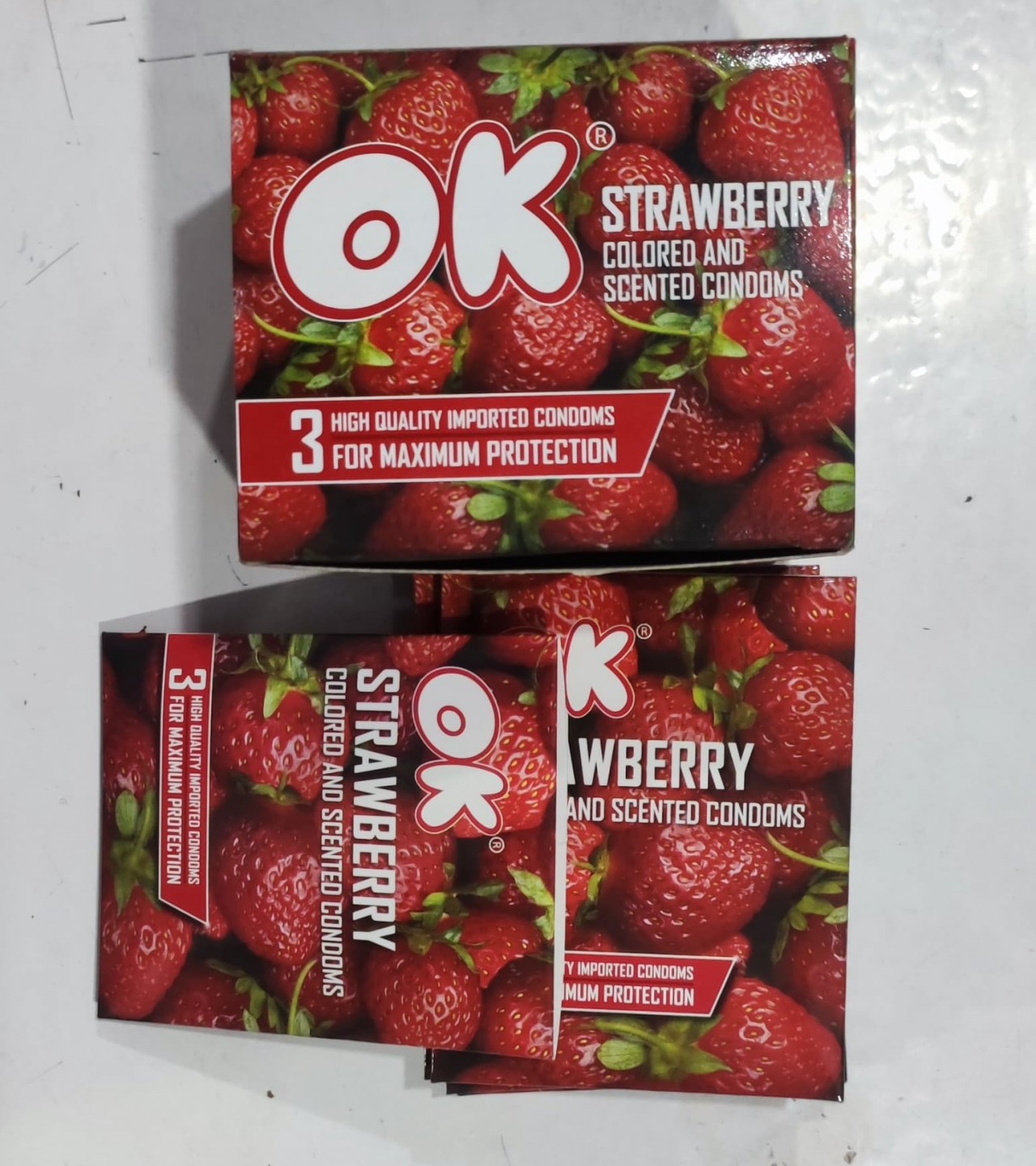 OK Strawberry colored And Scented Condoms